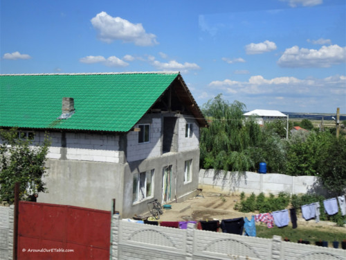 Between Salcuta and Podari - the new buildings have colourful metal roofs